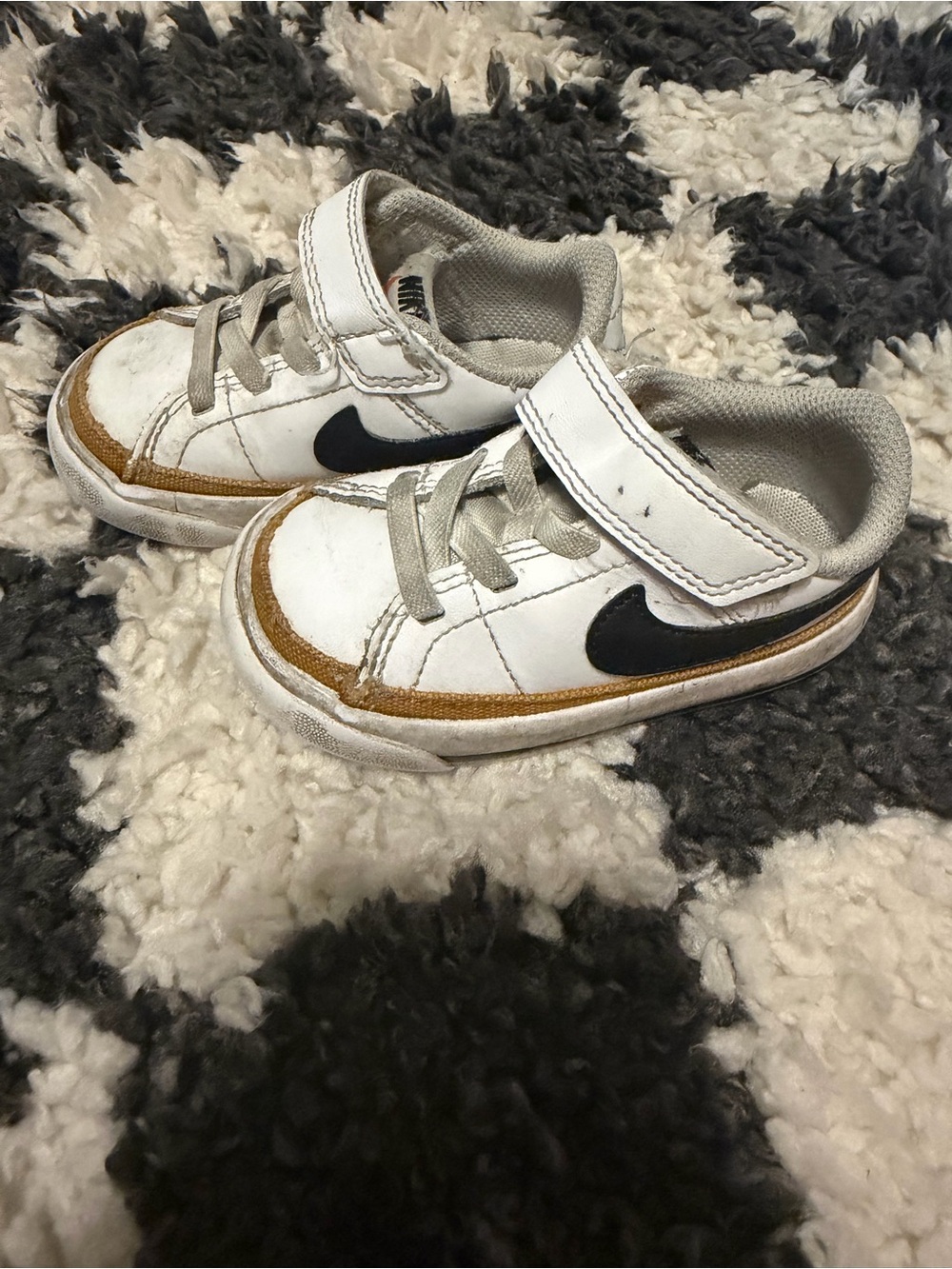 Nike Kids White Sneakers with Black Swoosh and Tan Trim